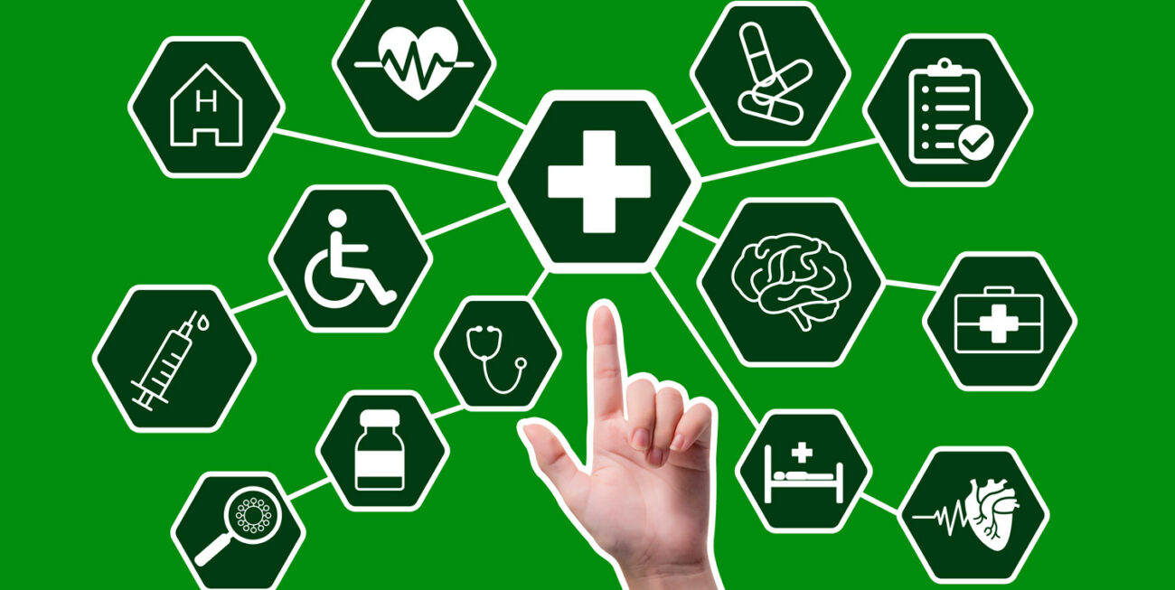Finger pointing to web of healthcare icons