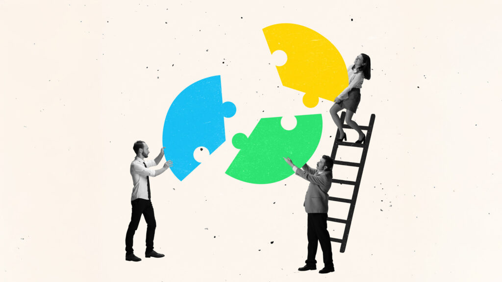 People bringing puzzle pieces together
