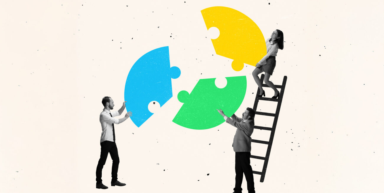 People bringing puzzle pieces together