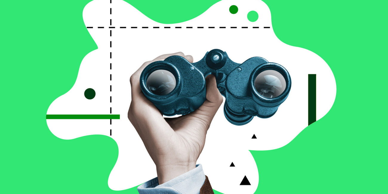 Hands holding binoculars