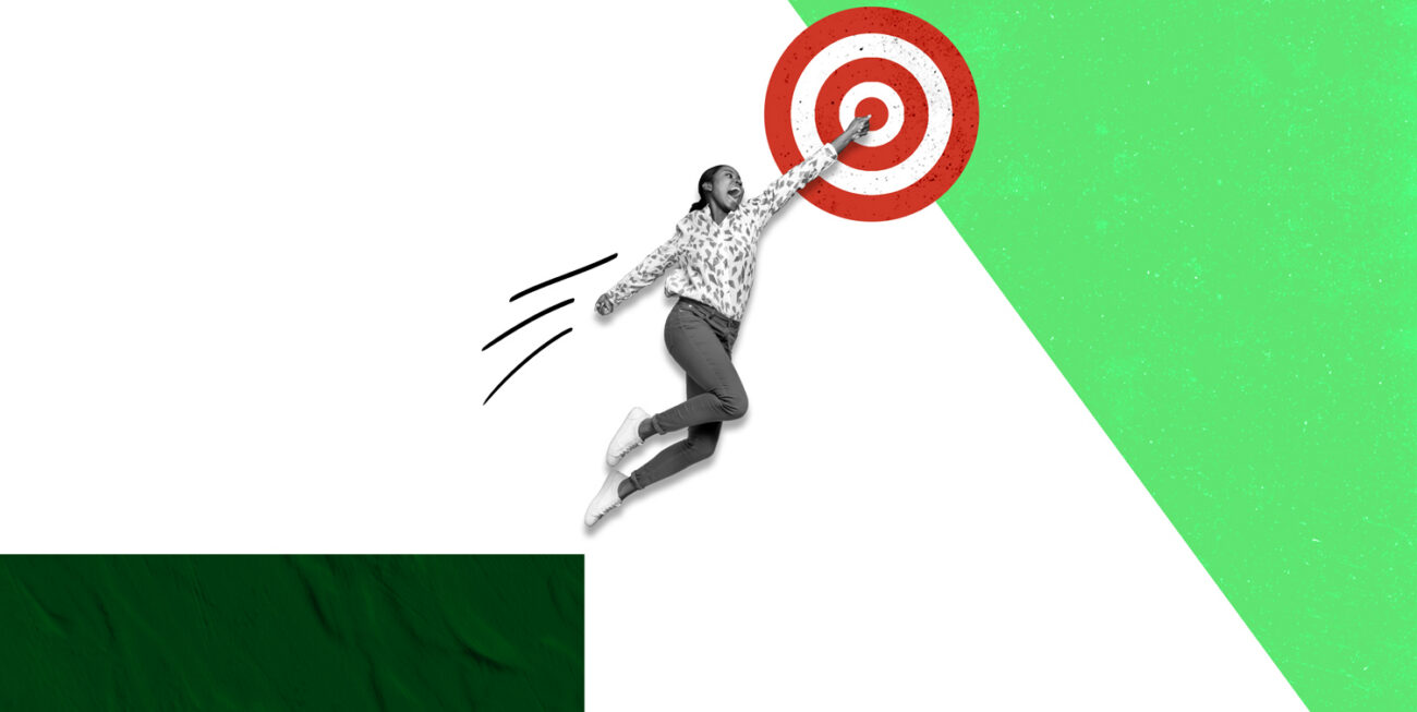 Person jumping to and hitting a target