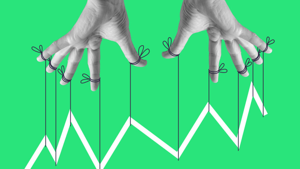 Hands controlling a line graph