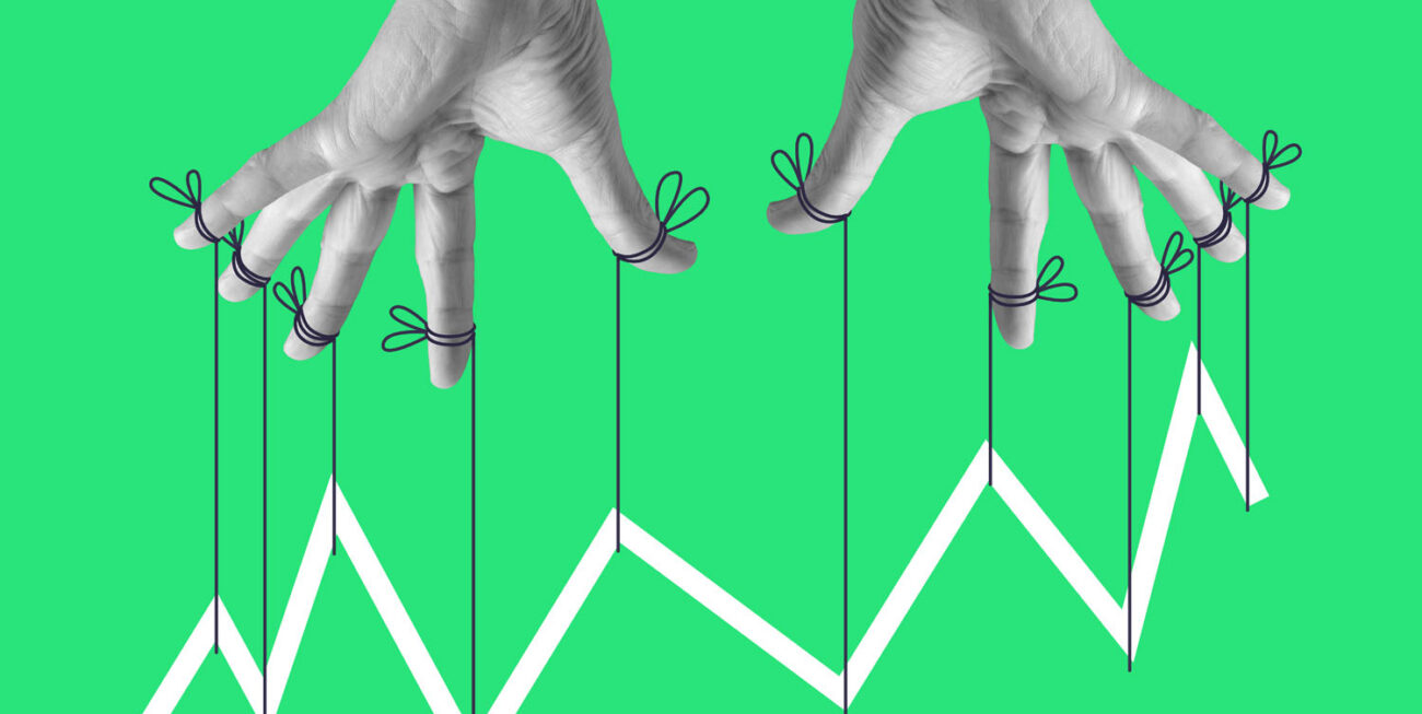 Hands controlling a line graph