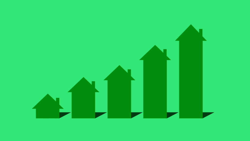 A rising bar graph made of house symbols