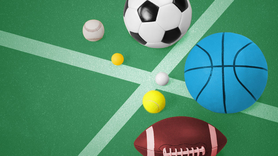 Various sports equipment on the ground