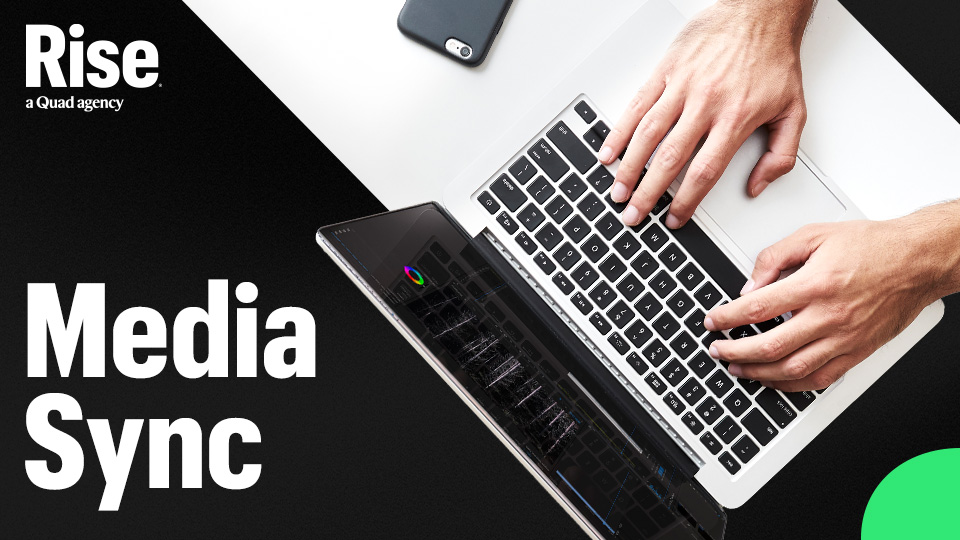 A pair of hands typing on a notebook computer. Text reads: Media Sync