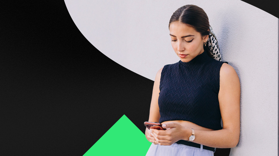 A woman looking at her cell phone