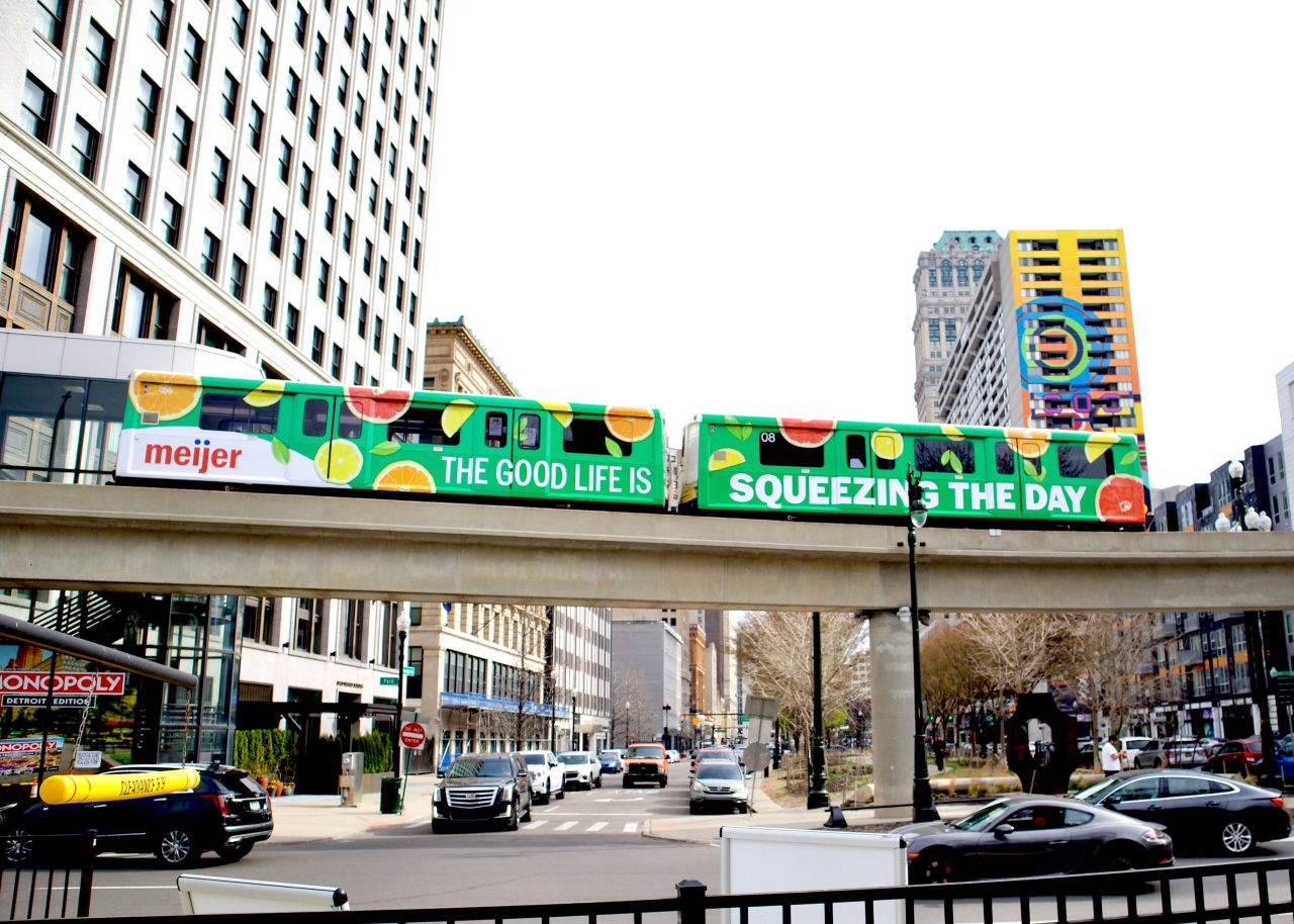 Meijer's OOH advertisements wrapped around a train on Detroit's elevated transit system.