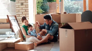 A family spending time together while unpacking boxes